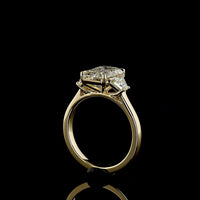 14K Yellow Gold Three Stone Ring with 2.69 Carat Emerald Cut Lab Diamond and 0.79 Carat Trapezoid Side Stones - 3.48 Carat Total Diamond Weight - Covaloro Fine Jewelry