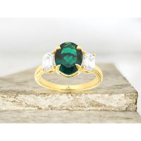 14K Yellow Gold Three-Stone Ring with 2-Carat Oval Lab-Grown Emerald and 1-Carat Total Rectangular Lab-Grown Diamonds - Royal Jewelry