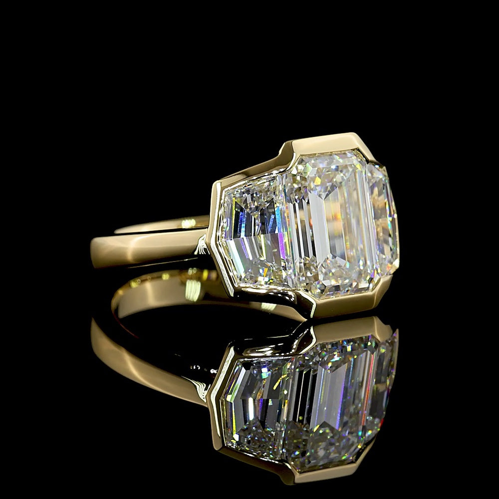 14K Yellow Gold Three Stone Ring with 3.03 Carat Emerald Cut Lab Diamond and 1.62 Carat Cadillac Cut Side Stones - 4.65 Total Carat Weight - Covaloro Fine Jewelry