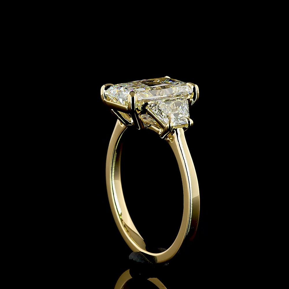 14K Yellow Gold Three Stone Ring with 3.14 Carat Radiant Lab Diamond and Trapezoid Side Stones - 4.15 Total Carat Weight, IGI Certified E VVS2 - Covaloro Fine Jewelry