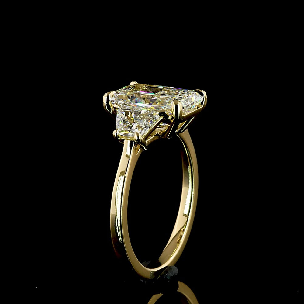 14K Yellow Gold Three Stone Ring with 3.14 Carat Radiant Lab Diamond and Trapezoid Side Stones - 4.15 Total Carat Weight, IGI Certified E VVS2 - Covaloro Fine Jewelry