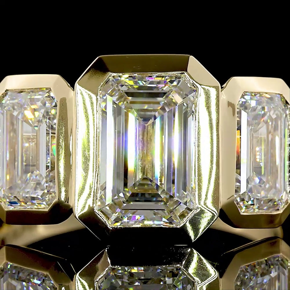 14K Yellow Gold Three-Stone Ring with 4.02 Carat Total Weight Emerald Cut CVD Lab Diamonds in Bezel Settings - Covaloro Fine Jewelry