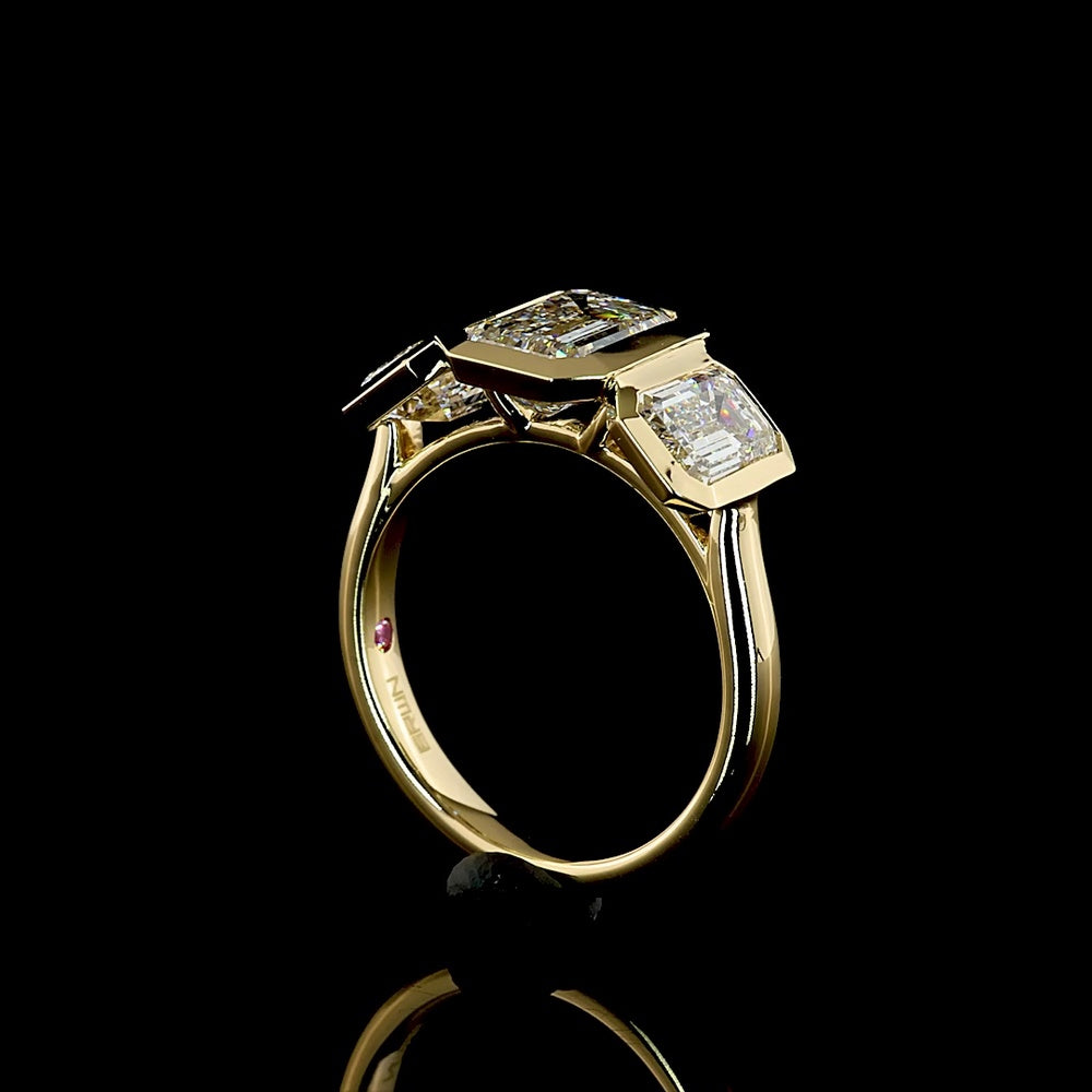 14K Yellow Gold Three-Stone Ring with 4.02 Carat Total Weight Emerald Cut CVD Lab Diamonds in Bezel Settings - Covaloro Fine Jewelry