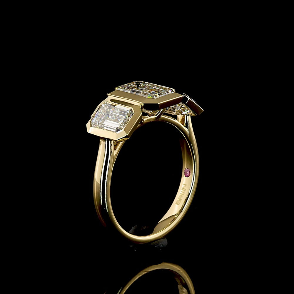 14K Yellow Gold Three-Stone Ring with 4.02 Carat Total Weight Emerald Cut CVD Lab Diamonds in Bezel Settings - Covaloro Fine Jewelry