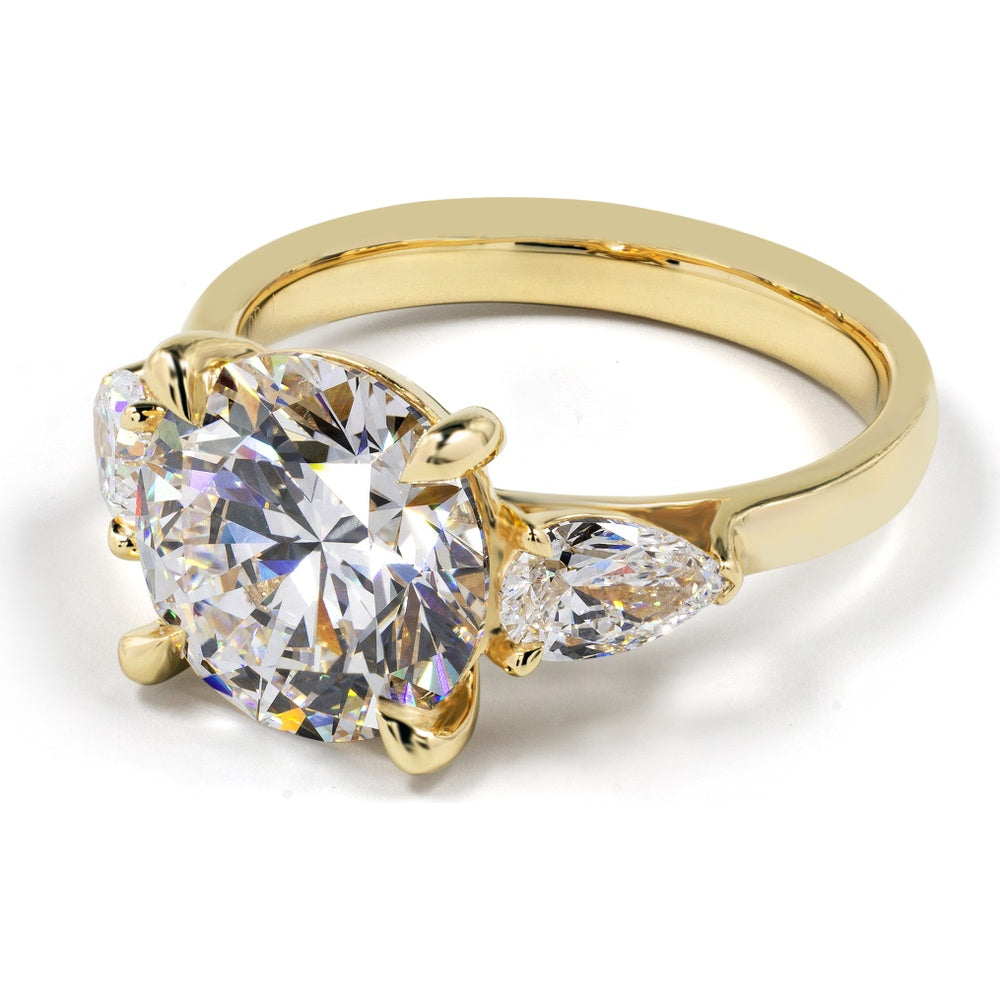 14K Yellow Gold Three-Stone Ring with 4.07 Carat Round Brilliant Cut Lab Diamond and 0.76 Carat Pear Shape Lab Diamond Side Stones - 4.83 Carat Total Diamond Weight, GIA Certified D VVS2 - Covaloro Fine Jewelry