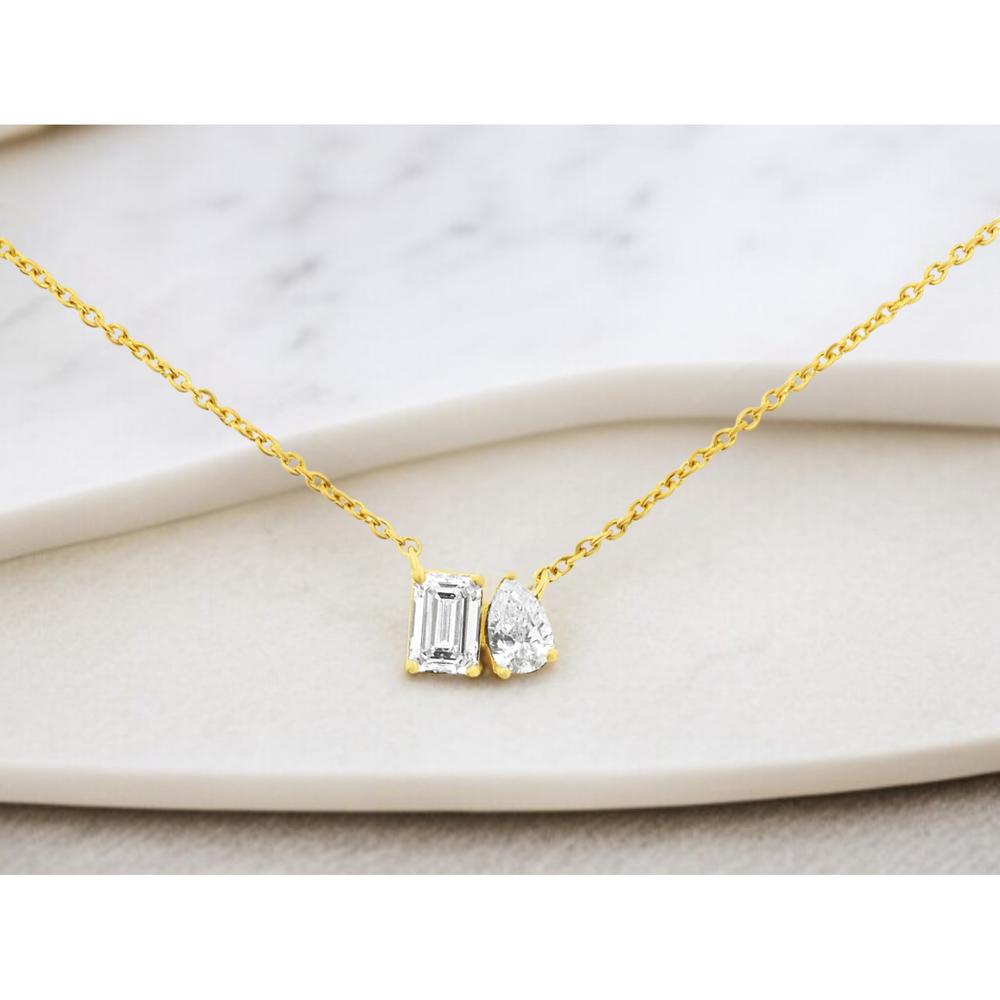 14K Yellow Gold Toi et Moi Necklace with Emerald Cut and Pear Cut Diamonds - 0.80 Carat Total Diamond Weight - Royal Jewelry