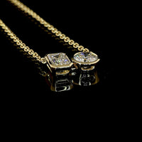 14K Yellow Gold Toi et Moi Pendant with 1.21 Carat Emerald Cut and 1.01 Carat Round Brilliant Lab Diamonds - 2.22 Total Carat Weight - Covaloro Fine Jewelry