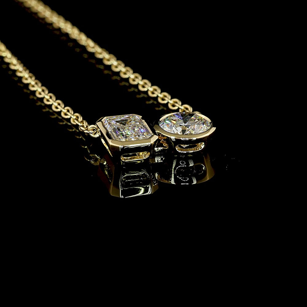 14K Yellow Gold Toi et Moi Pendant with 1.21 Carat Emerald Cut and 1.01 Carat Round Brilliant Lab Diamonds - 2.22 Total Carat Weight - Covaloro Fine Jewelry