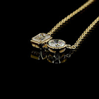 14K Yellow Gold Toi et Moi Pendant with 1.21 Carat Emerald Cut and 1.01 Carat Round Brilliant Lab Diamonds - 2.22 Total Carat Weight - Covaloro Fine Jewelry