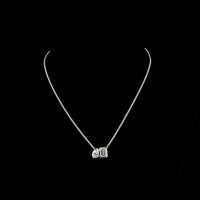 14K Yellow Gold Toi et Moi Pendant with 2.01 Carats Emerald Cut and 0.89 Carats Pear Shape Lab Diamonds - 2.90 Carats Total Diamond Weight - Covaloro Fine Jewelry