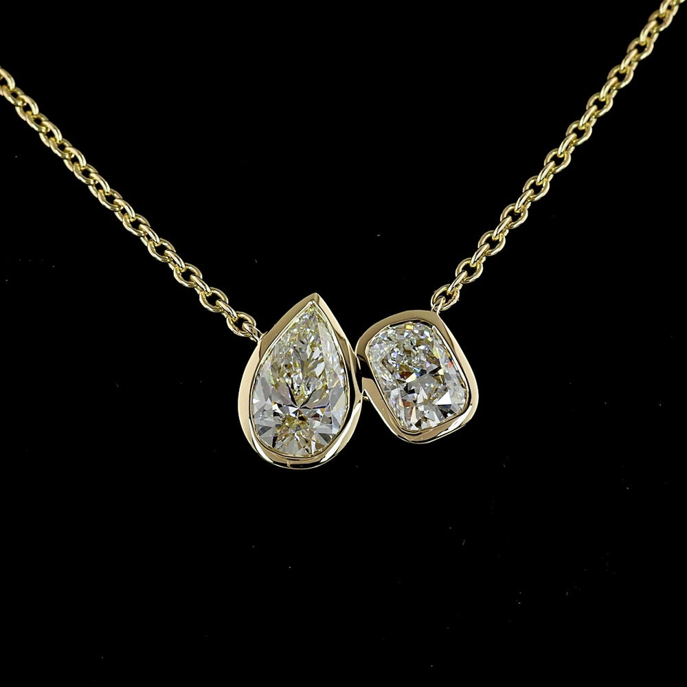 14K Yellow Gold Toi et Moi Pendant with Bezel Set Pear Shape Lab Diamond (1.50ct) and Bezel Set Second Lab Diamond (1.01ct) - 2.51 Carats Total Diamond Weight - Covaloro Fine Jewelry