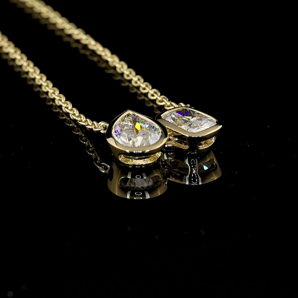 14K Yellow Gold Toi et Moi Pendant with Bezel Set Pear Shape Lab Diamond (1.50ct) and Bezel Set Second Lab Diamond (1.01ct) - 2.51 Carats Total Diamond Weight - Covaloro Fine Jewelry