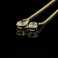 14K Yellow Gold Toi et Moi Pendant with Bezel Set Pear Shape Lab Diamond (1.50ct) and Bezel Set Second Lab Diamond (1.01ct) - 2.51 Carats Total Diamond Weight - Covaloro Fine Jewelry