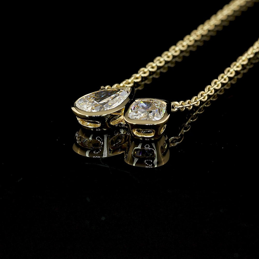 14K Yellow Gold Toi et Moi Pendant with Bezel Set Pear Shape Lab Diamond (1.50ct) and Bezel Set Second Lab Diamond (1.01ct) - 2.51 Carats Total Diamond Weight - Covaloro Fine Jewelry