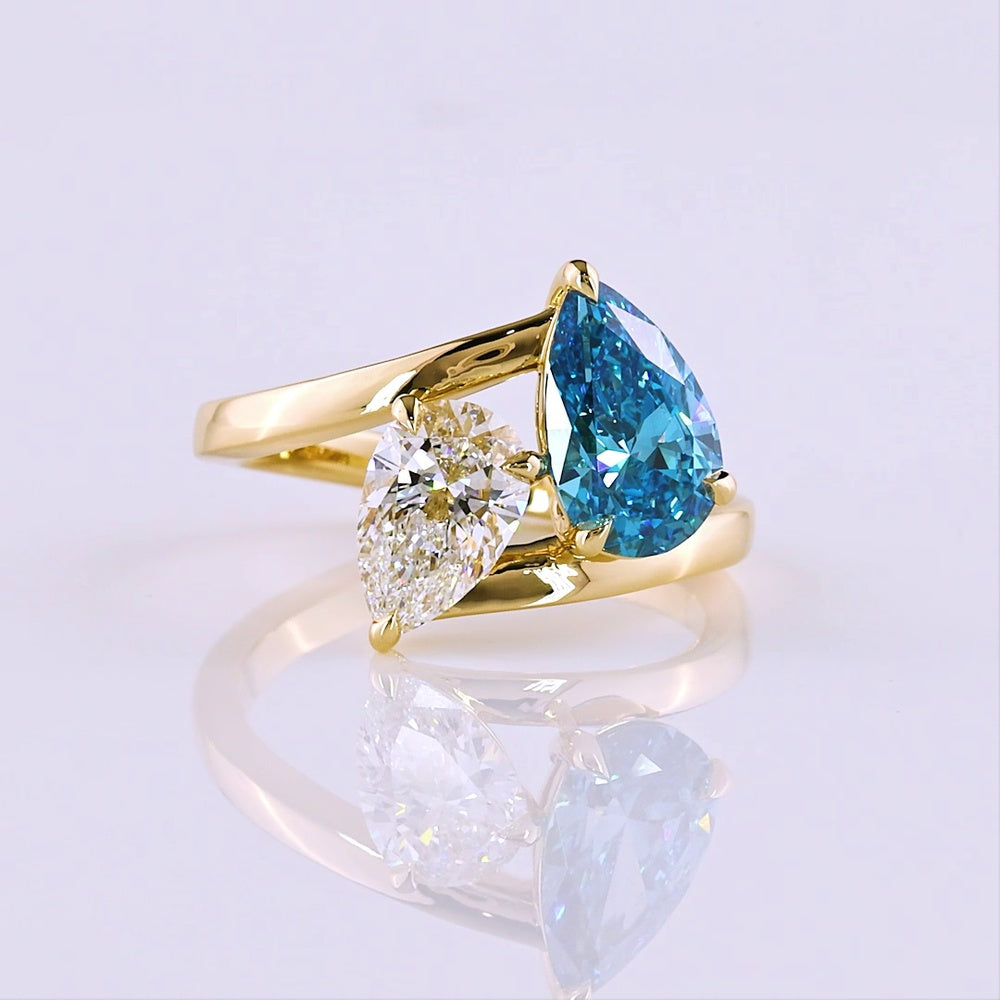 14K Yellow Gold Toi et Moi Ring with 1.50 Carat Pear Shape Fancy Blue Lab Diamond and 1.00 Carat Pear Shape Colorless Lab Diamond - 2.50 Carat Total Weight - Covaloro Fine Jewelry
