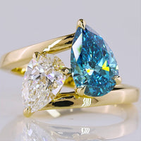 14K Yellow Gold Toi et Moi Ring with 1.50 Carat Pear Shape Fancy Blue Lab Diamond and 1.00 Carat Pear Shape Colorless Lab Diamond - 2.50 Carat Total Weight - Covaloro Fine Jewelry