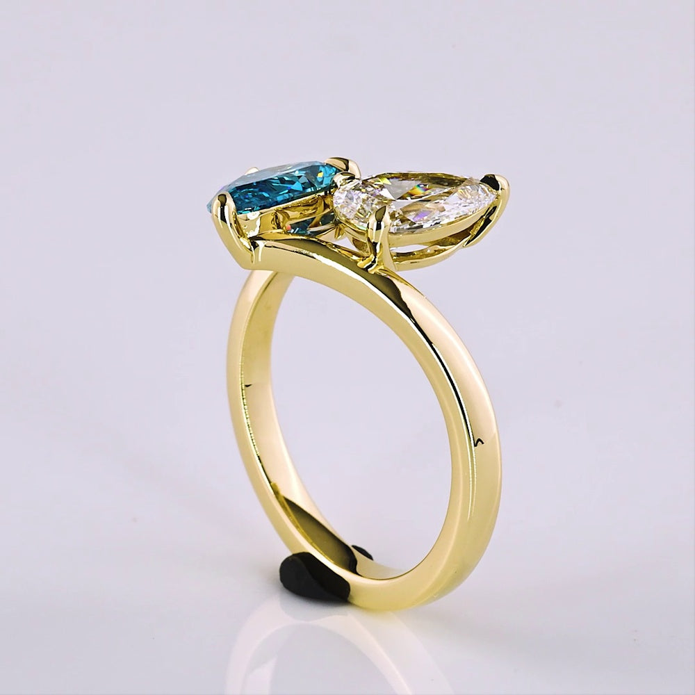 14K Yellow Gold Toi et Moi Ring with 1.50 Carat Pear Shape Fancy Blue Lab Diamond and 1.00 Carat Pear Shape Colorless Lab Diamond - 2.50 Carat Total Weight - Covaloro Fine Jewelry