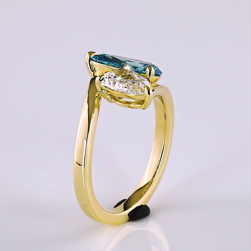 14K Yellow Gold Toi et Moi Ring with 1.50 Carat Pear Shape Fancy Blue Lab Diamond and 1.00 Carat Pear Shape Colorless Lab Diamond - 2.50 Carat Total Weight - Covaloro Fine Jewelry