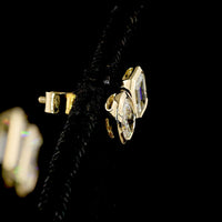 14K Yellow Gold Toi et Moi Stud Earrings with Bezel Set Emerald and Oval Lab Diamonds - 1.95 Carat Total Diamond Weight - Covaloro Fine Jewelry