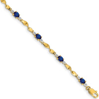 14K Yellow Gold Twisted Link Bracelet with Oval Blue Sapphires and Round Diamonds - 0.22 Carats Total Sapphire Weight, 0.005 Carats Total Diamond Weight by Monteluci Fine Jewelry