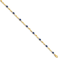 14K Yellow Gold Twisted Link Bracelet with Oval Blue Sapphires and Round Diamonds - 0.22 Carats Total Sapphire Weight, 0.005 Carats Total Diamond Weight by Monteluci Fine Jewelry