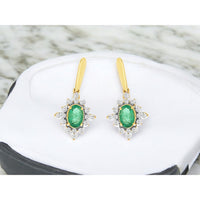 14K Yellow Gold Two-Tone Drop Earrings with Oval Emeralds and Diamond Sunburst Halo - 0.88 Carat Total Emerald Weight - Royal Jewelry