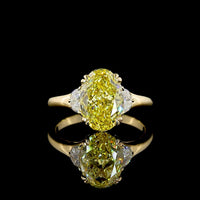 14K Yellow Gold Two-Tone Three Stone Ring with 3.02 Carat Oval Fancy Intense Yellow Lab Diamond and 0.30 Carat Half-Moon Side Stones - Total Carat Weight 3.32 - Covaloro Fine Jewelry