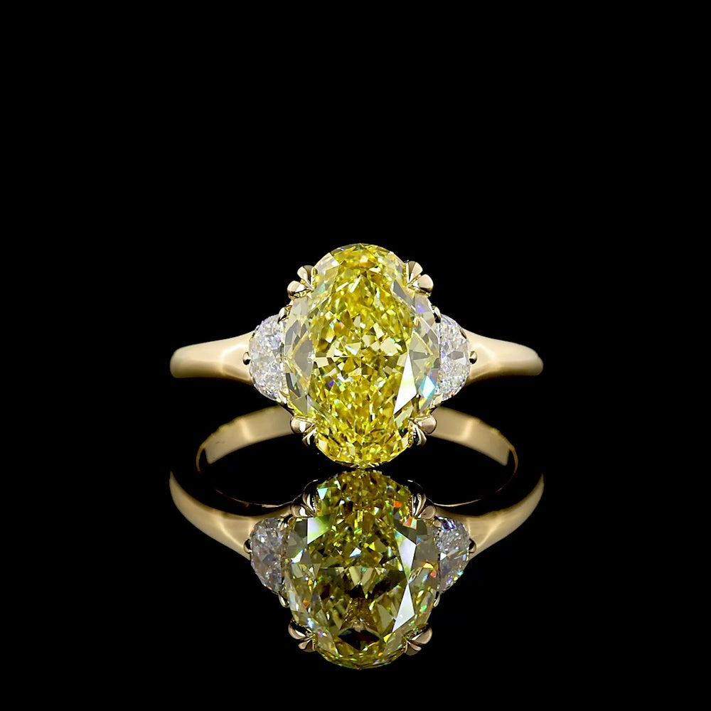 14K Yellow Gold Two-Tone Three Stone Ring with 3.02 Carat Oval Fancy Intense Yellow Lab Diamond and 0.30 Carat Half-Moon Side Stones - Total Carat Weight 3.32 - Covaloro Fine Jewelry