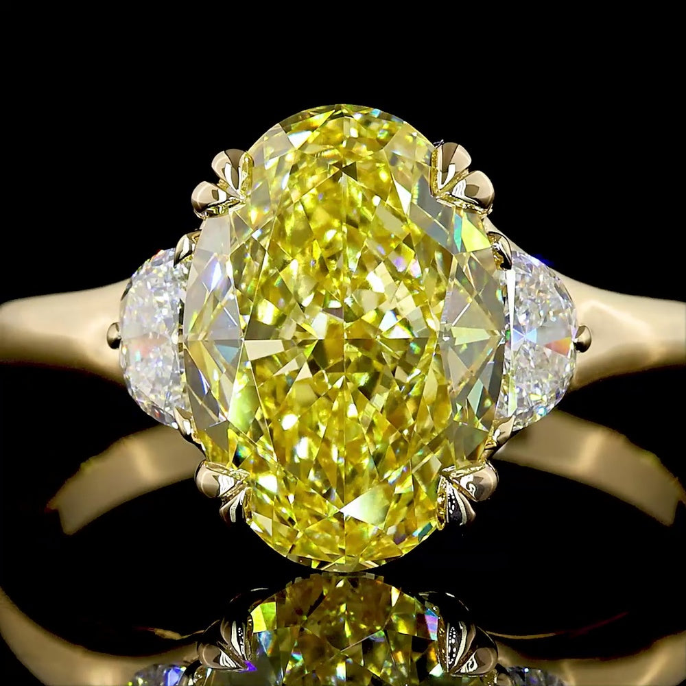 14K Yellow Gold Two-Tone Three Stone Ring with 3.02 Carat Oval Fancy Intense Yellow Lab Diamond and 0.30 Carat Half-Moon Side Stones - Total Carat Weight 3.32 - Covaloro Fine Jewelry