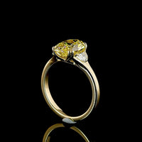 14K Yellow Gold Two-Tone Three Stone Ring with 3.02 Carat Oval Fancy Intense Yellow Lab Diamond and 0.30 Carat Half-Moon Side Stones - Total Carat Weight 3.32 - Covaloro Fine Jewelry