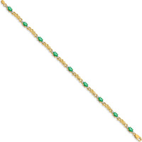 14K Yellow Gold X-Design Bracelet with Oval Emeralds and Round Diamonds - 0.21 Carats Total Emerald Weight, 0.01 Carats Total Diamond Weight by Monteluci Fine Jewelry