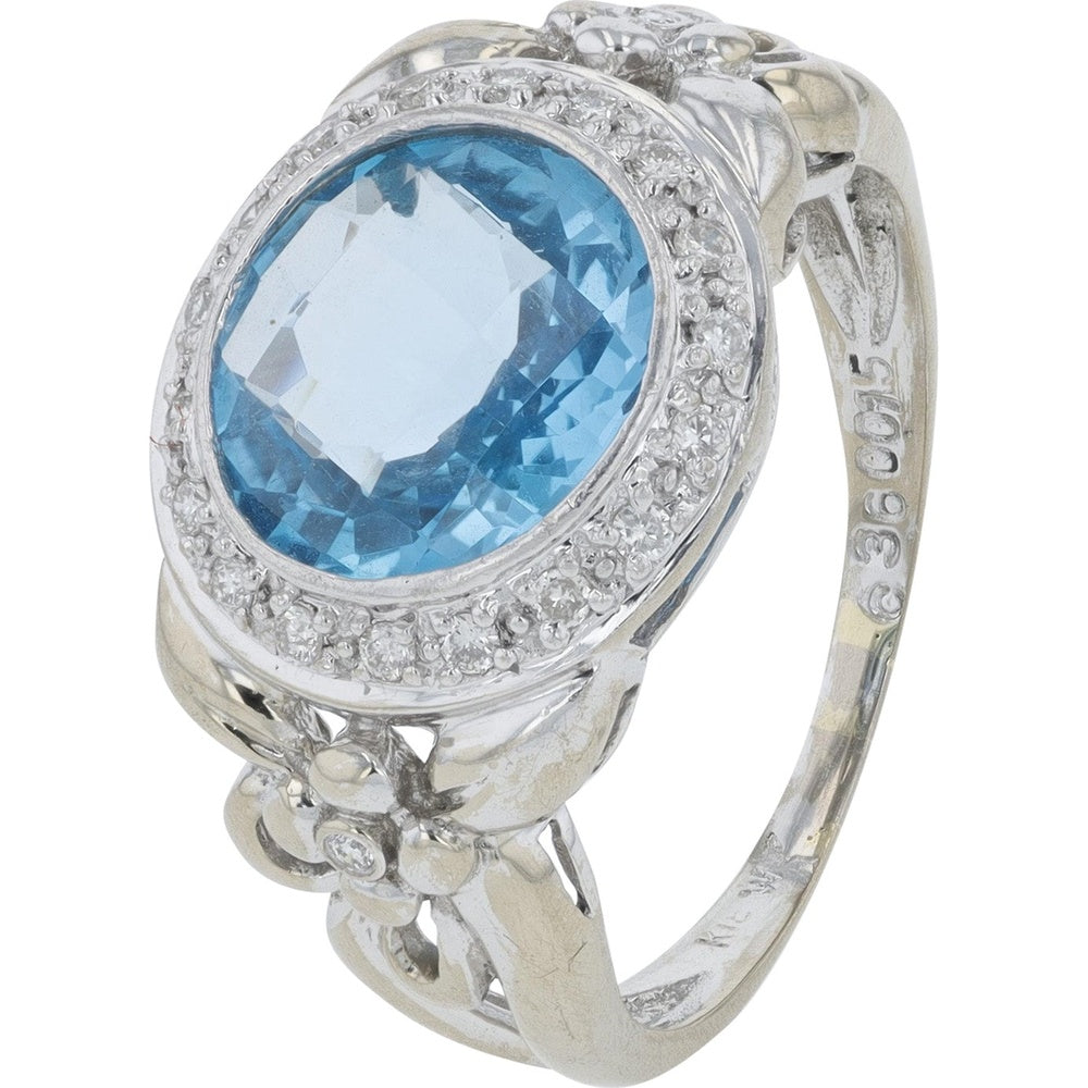 18K White Gold 3.60 Carat Oval Blue Topaz Ring with Diamond Halo and Floral Milgrain Detail