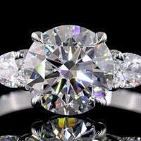18K White Gold 3-Stone Ring with 2.19 Carats Round Brilliant Lab Diamond and 0.42 Carats Pear Shaped Side Diamonds - 2.61 Carats Total Diamond Weight - Covaloro Fine Jewelry
