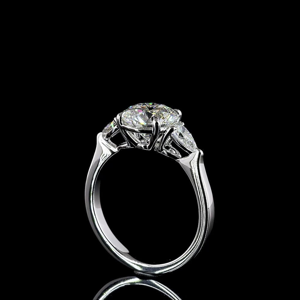 18K White Gold 3-Stone Ring with 2.19 Carats Round Brilliant Lab Diamond and 0.42 Carats Pear Shaped Side Diamonds - 2.61 Carats Total Diamond Weight - Covaloro Fine Jewelry