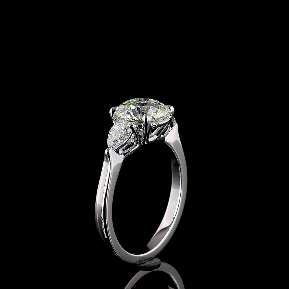 18K White Gold 3-Stone Ring with 2.19 Carats Round Brilliant Lab Diamond and 0.42 Carats Pear Shaped Side Diamonds - 2.61 Carats Total Diamond Weight - Covaloro Fine Jewelry