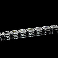 18K White Gold 7.04 Carat Tennis Bracelet with East-West Bezel Set Emerald Cut Lab Diamonds - 30 Stones of E-F VS1 Quality - Covaloro Fine Jewelry