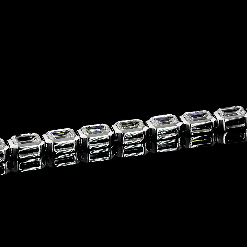 18K White Gold 7.04 Carat Tennis Bracelet with East-West Bezel Set Emerald Cut Lab Diamonds - 30 Stones of E-F VS1 Quality - Covaloro Fine Jewelry