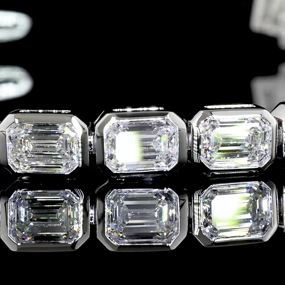 18K White Gold 7.04 Carat Tennis Bracelet with East-West Bezel Set Emerald Cut Lab Diamonds - 30 Stones of E-F VS1 Quality - Covaloro Fine Jewelry