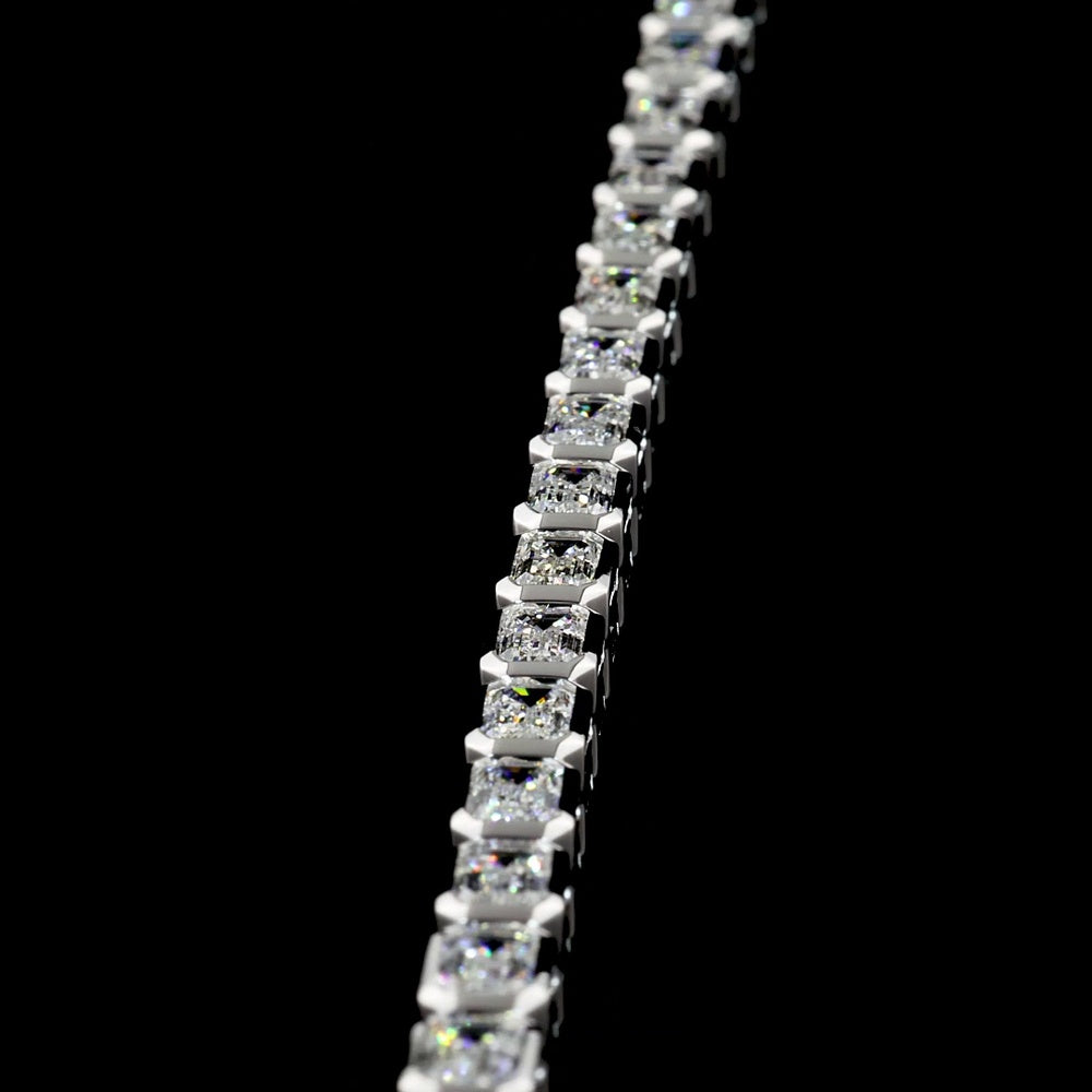 18K White Gold 7.04 Carat Tennis Bracelet with East-West Bezel Set Emerald Cut Lab Diamonds - 30 Stones of E-F VS1 Quality - Covaloro Fine Jewelry