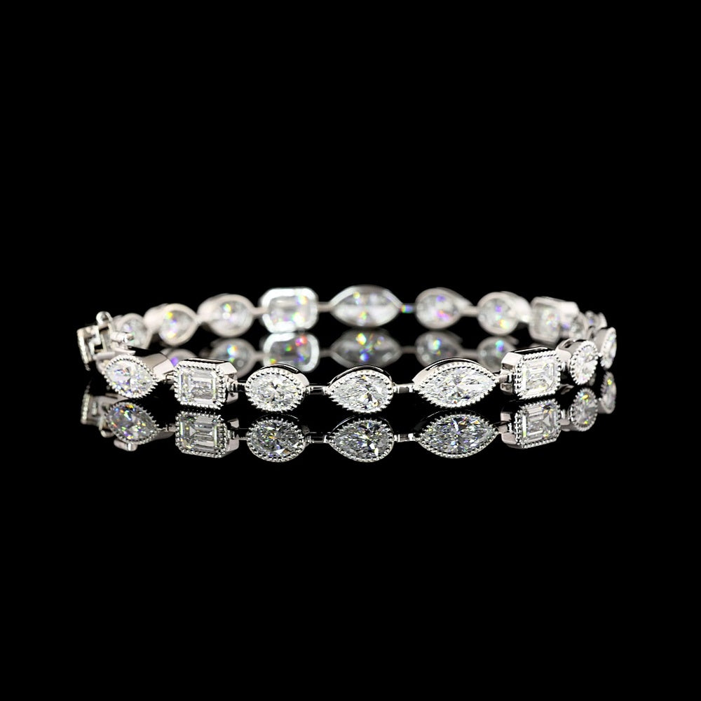 18K White Gold 7.5" Tennis Bracelet with East-West Bezel Set Emerald, Oval, and Pear Cut Lab Diamonds - 10.01 Carat Total Weight - Covaloro Fine Jewelry