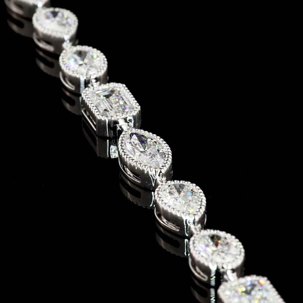 18K White Gold 7.5" Tennis Bracelet with East-West Bezel Set Emerald, Oval, and Pear Cut Lab Diamonds - 10.01 Carat Total Weight - Covaloro Fine Jewelry