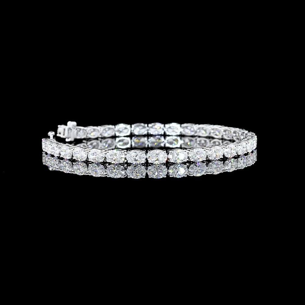 18K White Gold 7.5" Tennis Bracelet with East-West Prong Set Oval Lab Diamonds - 9.41 Carat Total Weight, E-F VVS2 - Covaloro Fine Jewelry