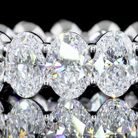18K White Gold Eternity Band with North-South Prong Set Oval Cut Lab Diamonds - 7.51 Total Carat Weight, E-F Color, VS Clarity - Covaloro Fine Jewelry