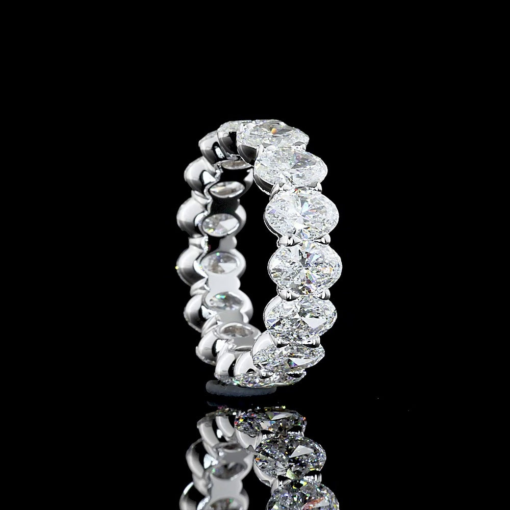 18K White Gold Eternity Band with North-South Prong Set Oval Cut Lab Diamonds - 7.51 Total Carat Weight, E-F Color, VS Clarity - Covaloro Fine Jewelry