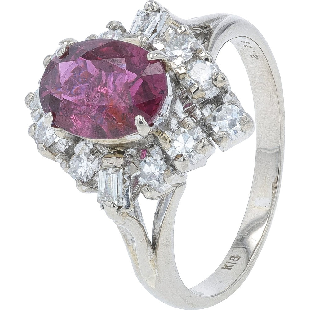18K White Gold Halo Ring with 2.22 Carat Oval Ruby and 0.40 Carat Round and Baguette Diamond Accents - Size 6.25