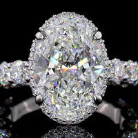 18K White Gold Hidden Halo Ring with 5.01 Carat Oval Cut E VVS2 Lab Diamond and 2.58 Carat Brilliant Round Accent Diamonds - Total 7.59 Carats - Covaloro Fine Jewelry