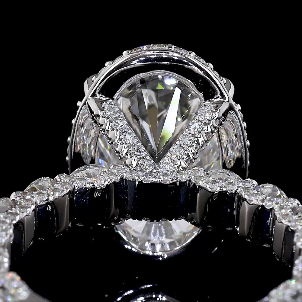 18K White Gold Hidden Halo Ring with 5.01 Carat Oval Cut E VVS2 Lab Diamond and 2.58 Carat Brilliant Round Accent Diamonds - Total 7.59 Carats - Covaloro Fine Jewelry