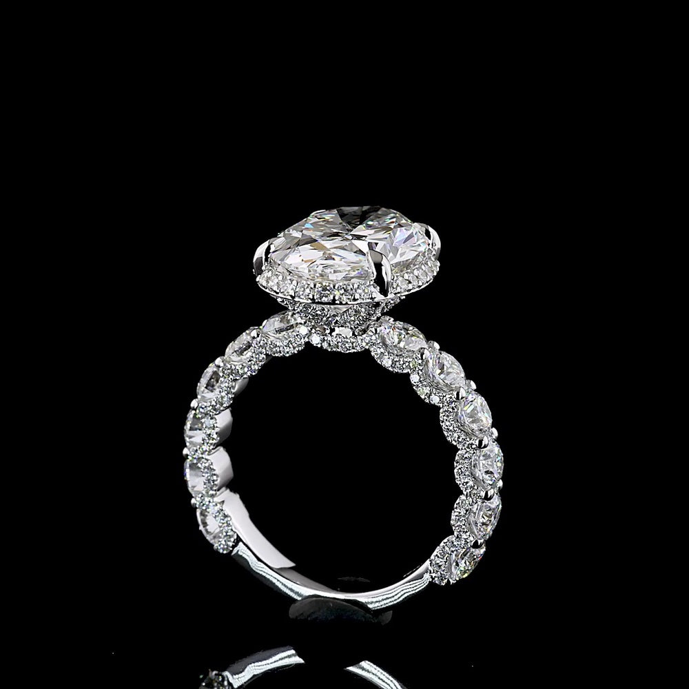 18K White Gold Hidden Halo Ring with 5.01 Carat Oval Cut E VVS2 Lab Diamond and 2.58 Carat Brilliant Round Accent Diamonds - Total 7.59 Carats - Covaloro Fine Jewelry