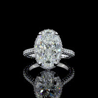 18K White Gold Hidden Halo Ring with 5.09 Carat Oval Cut Lab Diamond Center and 1.39 Carat Accent Diamonds - 6.48 Total Carat Weight - Covaloro Fine Jewelry