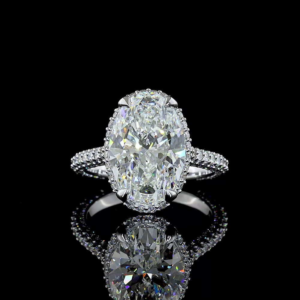 18K White Gold Hidden Halo Ring with 5.09 Carat Oval Cut Lab Diamond Center and 1.39 Carat Accent Diamonds - 6.48 Total Carat Weight - Covaloro Fine Jewelry